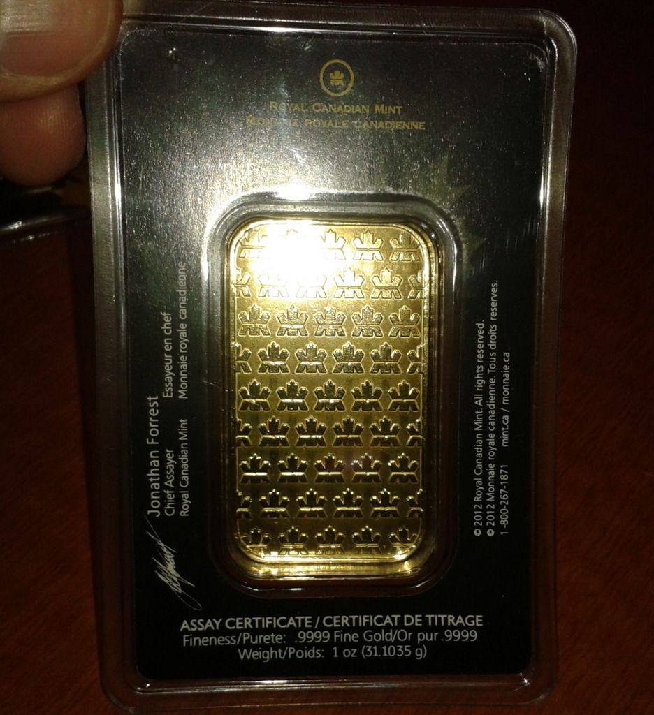 Scary good Fake 1 oz gold Royal Canadian Mint bars in Assay cards